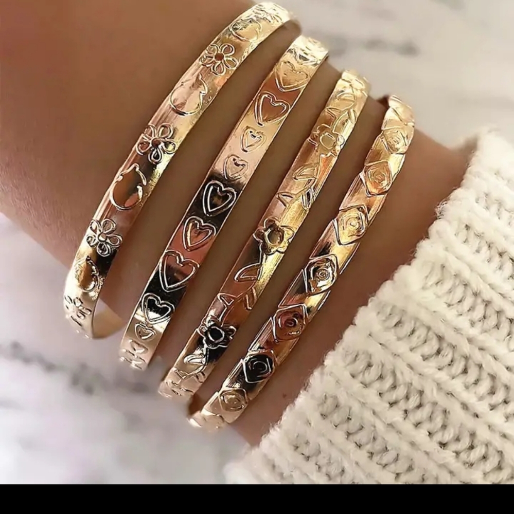 Beautiful 4 piece set of golden bracelets